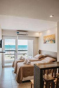 En eller flere senge i et værelse på Mar del Este apart