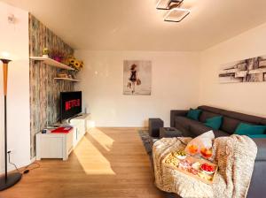 Χώρος καθιστικού στο ISEO LAKE 3-Bedroom just 40 meters from the lake and 12 meters from Piazza Garibaldi