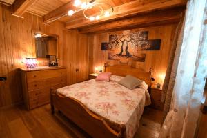 Postel nebo postele na pokoji v ubytování Maison Elie