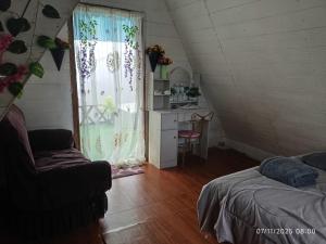 Ένα ή περισσότερα κρεβάτια σε δωμάτιο στο น่านฟ้าสะปัน