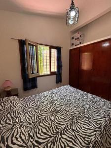 Postel nebo postele na pokoji v ubytování Casa Hikari HG