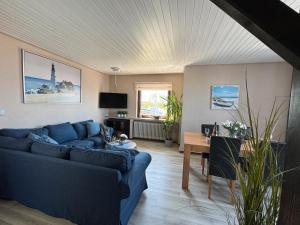 Телевизор и/или развлекательный центр в Ferienwohnungen Briesenick Radde