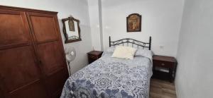 Giường trong phòng chung tại Cortijo Palomo +18 ảnh