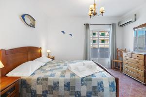 Ένα ή περισσότερα κρεβάτια σε δωμάτιο στο Moradia 41