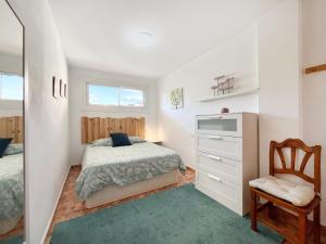 Postel nebo postele na pokoji v ubytování Almirall Playa + 4 fotografie