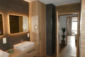 Ванная комната в Ferienwohnungen Briesenick Radde +104 фотографии