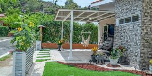 Κήπος έξω από το JJ Lux Residential