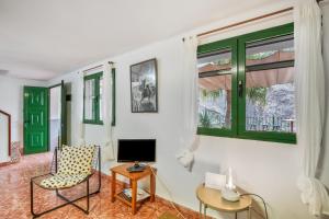 Et tv og/eller underholdning på Alojamientos Rurales La Montaña