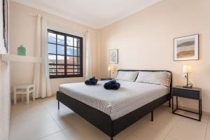 Giường trong phòng chung tại Casa Marley – Balcòn Del Mar +17 ảnh