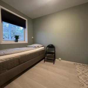 Ένα ή περισσότερα κρεβάτια σε δωμάτιο στο Nice apartment 15 min to Oslo center Free parking