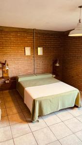 Postel nebo postele na pokoji v ubytování La Vaca, Casa de Campo