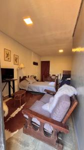 Телевизор и/или развлекательный центр в Encanto das Araucárias II