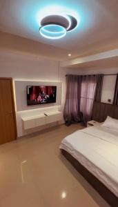 Ένα ή περισσότερα κρεβάτια σε δωμάτιο στο Swanky Spaces