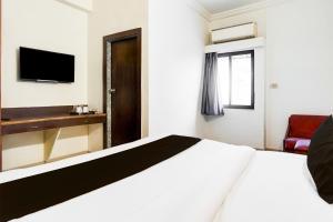 Μια τηλεόραση ή/και κέντρο ψυχαγωγίας στο Super Collection O Maninagar Formerly Park Land