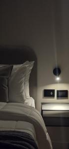 Ένα ή περισσότερα κρεβάτια σε δωμάτιο στο Hotel Boutique Ubuntu