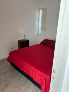 Ένα ή περισσότερα κρεβάτια σε δωμάτιο στο Apartamento 2 dormitorios