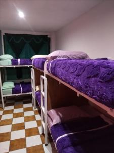 Кровать или кровати в номере Nawal Hostel