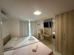 En eller flere senge i et værelse på Luxor Paulo Miranda by Allmare Temporada + 29 billeder