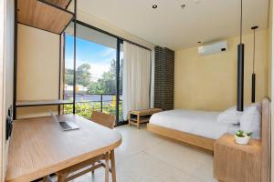 Ένα ή περισσότερα κρεβάτια σε δωμάτιο στο Iconik 33 Hotel +36 φωτογραφίες