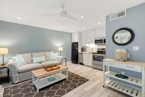 a living room with a couch and a table at SS3524: 3524 Seascape in Kiawah Island