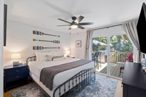 a bedroom with a bed and a ceiling fan at SWL1133: 1133 Summerwind Lane in Seabrook Island +49 photos