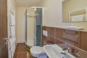 Koupelna v ubytování City Hotel Wetzlar + 18 fotografií