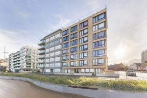een weergave van een groot gebouw in een stad bij Sun Beach 0201 in Sint-Idesbald