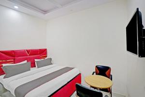 Et tv og/eller underholdning på Hotel O Golden Key Inn