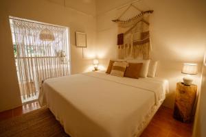 Postel nebo postele na pokoji v ubytování Tribe Boutique Hotel - Adults Only