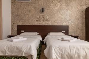 Postel nebo postele na pokoji v ubytování Pensiunea VIS