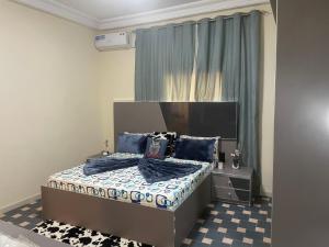 Postel nebo postele na pokoji v ubytování La Voile dor