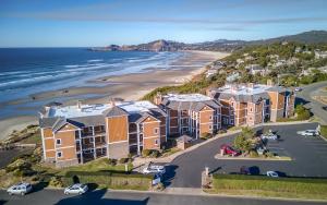 an aerial view of apartment buildings next to the beach at Sunsets at the Shoreline in Newport