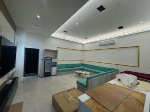 TV a/nebo společenská místnost v ubytování 慕漾民宿 包棟獨棟游泳池近羅運