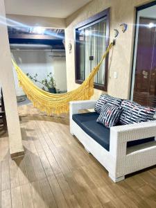 Postel nebo postele na pokoji v ubytování Aconchegante casa de Temporada em Búzios.