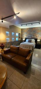 Ένα ή περισσότερα κρεβάτια σε δωμάτιο στο Luxury Suites Dubai a 100 mts del consulado