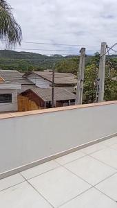 a view from the roof of a house at Recanto Santa Lídia in Penha +2 photos