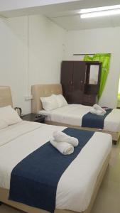 Ένα ή περισσότερα κρεβάτια σε δωμάτιο στο Rest N Go CH