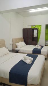 Ένα ή περισσότερα κρεβάτια σε δωμάτιο στο Rest N Go CH +52 φωτογραφίες