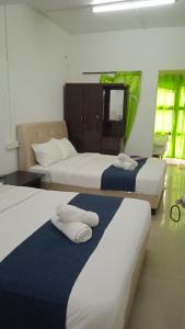 Ένα ή περισσότερα κρεβάτια σε δωμάτιο στο Rest N Go CH