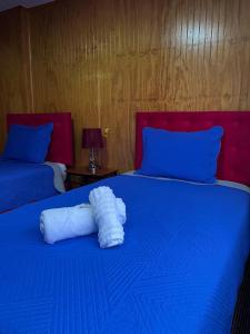 Ένα ή περισσότερα κρεβάτια σε δωμάτιο στο Hotel Gran Luna