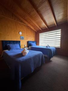 Ένα ή περισσότερα κρεβάτια σε δωμάτιο στο Hotel Gran Luna