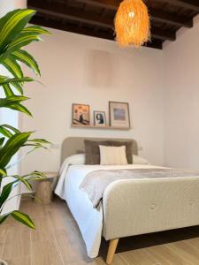 Postel nebo postele na pokoji v ubytování Loft Mamalú Jerez