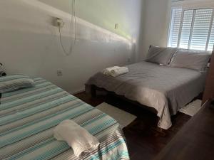 Ένα ή περισσότερα κρεβάτια σε δωμάτιο στο Casa da Mara +13 φωτογραφίες