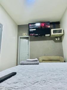 Ένα ή περισσότερα κρεβάτια σε δωμάτιο στο Ask hotel