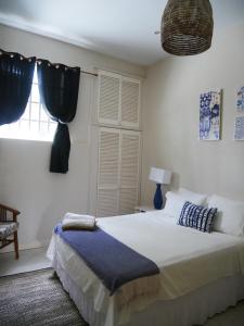 Ένα ή περισσότερα κρεβάτια σε δωμάτιο στο Rodney Heights 3-Bed Apt