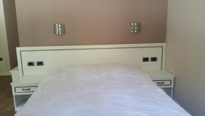 Letto o letti in una camera di Hotel Margjeka
