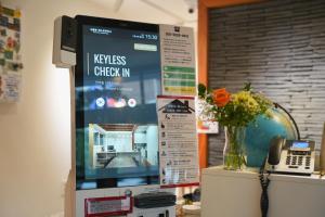 a box sitting on top of a table with a phone at SeoulView Guest House in Seoul