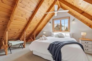 Ένα ή περισσότερα κρεβάτια σε δωμάτιο στο Otago Cottage