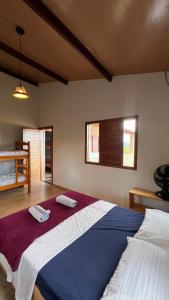 En eller flere senge i et værelse på Casa Mirante dos Muricis Vale do Capão + 50 billeder