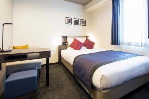 Postel nebo postele na pokoji v ubytování HOTEL MYSTAYS Kanda + 16 fotografií